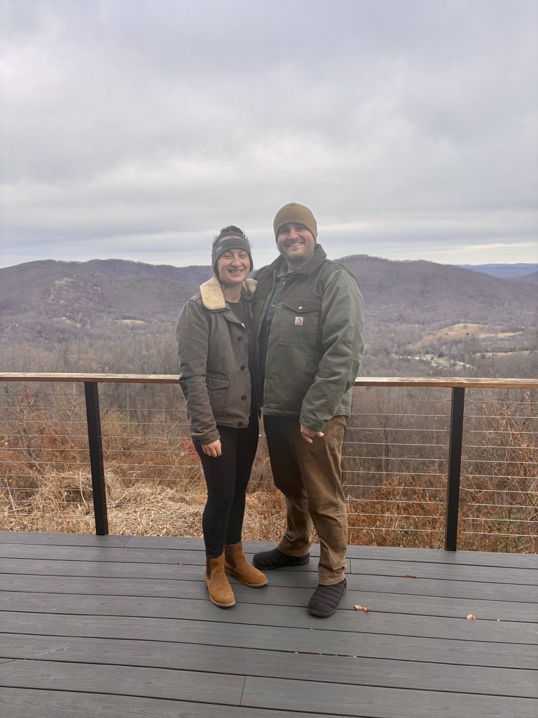Sarah and Brady on the deck overlooking the Blue Ridge Mountains